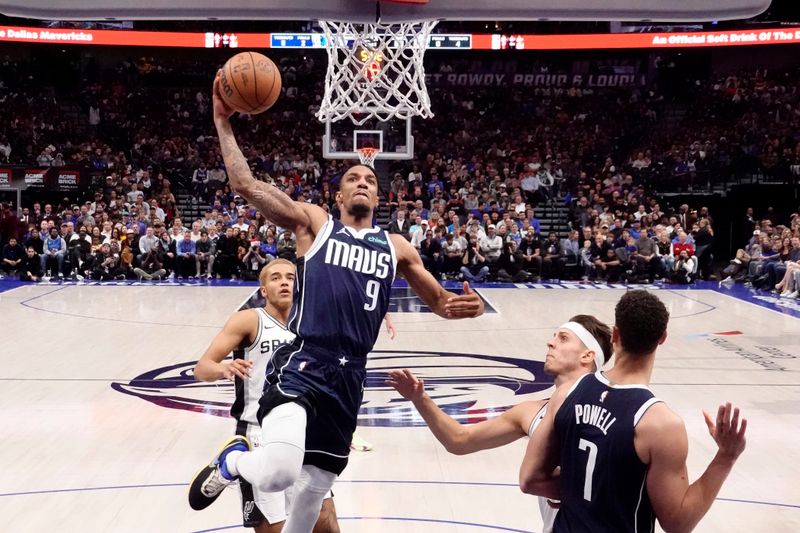 DALLAS, TEXAS - DECEMBER 23: A.J. Lawson #9 of the Dallas Mavericks makes a move to the basket during the first half against the San Antonio Spurs at American Airlines Center on December 23, 2023 in Dallas, Texas. NOTE TO USER: User expressly acknowledges and agrees that, by downloading and or using this photograph, User is consenting to the terms and conditions of the Getty Images License Agreement. (Photo by Sam Hodde/Getty Images)