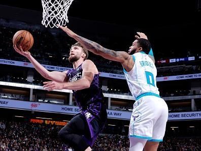 SACRAMENTO, CA - JANUARY 2: Domantas Sabonis #10 of the Sacramento Kings drives to the basket during the game against the Charlotte Hornets on January 2, 2024 at Golden 1 Center in Sacramento, California. NOTE TO USER: User expressly acknowledges and agrees that, by downloading and or using this Photograph, user is consenting to the terms and conditions of the Getty Images License Agreement. Mandatory Copyright Notice: Copyright 2024 NBAE (Photo by Rocky Widner/NBAE via Getty Images)