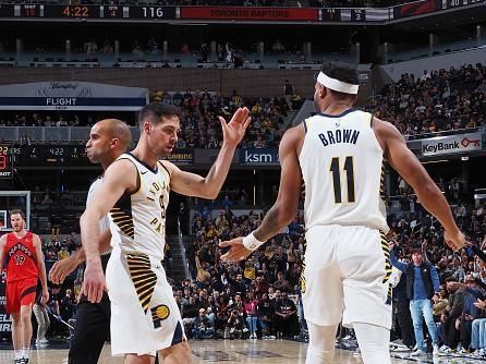 INDIANAPOLIS, IN - NOVEMBER 22: T.J. McConnell #9 high fives Bruce Brown #11 of the Indiana Pacers during the game against the Toronto Raptors on November 22, 2023 at Gainbridge Fieldhouse in Indianapolis, Indiana. NOTE TO USER: User expressly acknowledges and agrees that, by downloading and or using this Photograph, user is consenting to the terms and conditions of the Getty Images License Agreement. Mandatory Copyright Notice: Copyright 2023 NBAE (Photo by Ron Hoskins/NBAE via Getty Images)