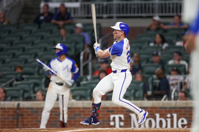 Sep 7, 2024; Atlanta, Georgia, USA; Atlanta Braves left fielder Jarred Kelenic (24) hits an RBI single against the Toronto Blue Jays in the ninth inning at Truist Park. Mandatory Credit: Brett Davis-Imagn Images
