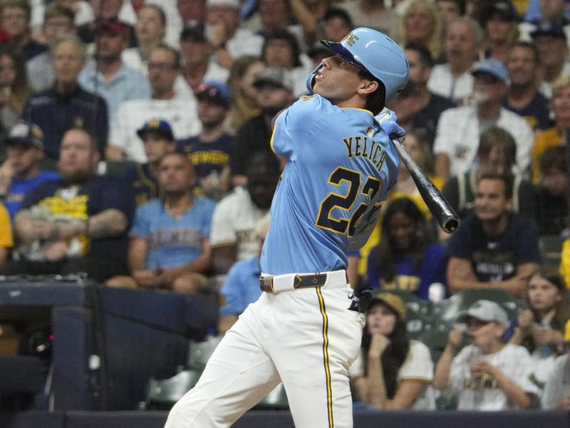 Sep 12, 2025; Milwaukee, Wisconsin, USA; Milwaukee Brewers outfielder Christian Yelich (22) hits a home run against the St. Louis Cardinals in the seventh inning at American Family Field. Mandatory Credit: Michael McLoone-Imagn Images