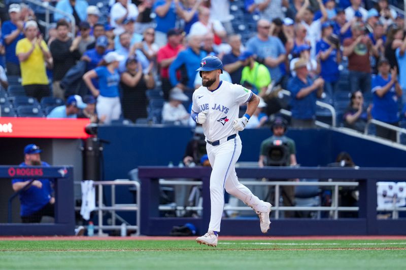 May 15, 2025; Toronto, Ontario, CAN; Toronto Blue Jays outfielder Nathan Lukes (38) hits a home run against the Tampa Bay Rays during the eighth inning at Rogers Centre. Mandatory Credit: Kevin Sousa-Imagn Images