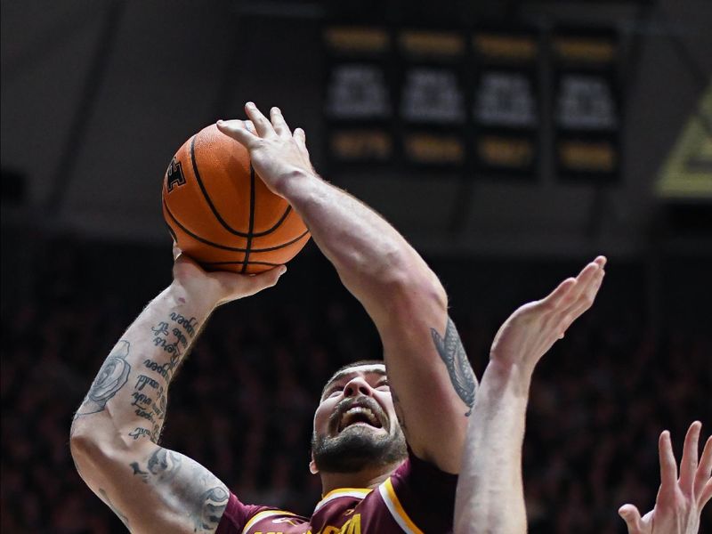 Feb 15, 2024; West Lafayette, Indiana, USA; Minnesota Golden Gophers center Jack Wilson (33) scores against Purdue Boilermakers forward Caleb Furst (1) during the first half at Mackey Arena. Mandatory Credit: Robert Goddin-USA TODAY Sports