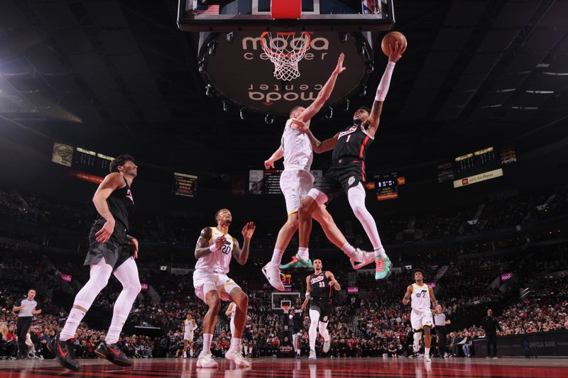 PORTLAND, OR - DECEMBER 6: Anfernee Simons #1 of the Portland Trail Blazers drives to the basket during the game against the Utah Jazz on December 6, 2024 at the Moda Center Arena in Portland, Oregon. NOTE TO USER: User expressly acknowledges and agrees that, by downloading and or using this photograph, user is consenting to the terms and conditions of the Getty Images License Agreement. Mandatory Copyright Notice: Copyright 2024 NBAE (Photo by Cameron Browne/NBAE via Getty Images)