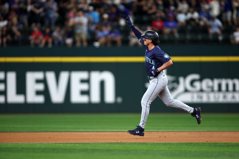 Sep 20, 2024; Arlington, Texas, USA; Seattle Mariners third base Josh Rojas (4) reacts after hitting a solo home run in the third inning against the Texas Rangers at Globe Life Field. Mandatory Credit: Tim Heitman-Imagn Images