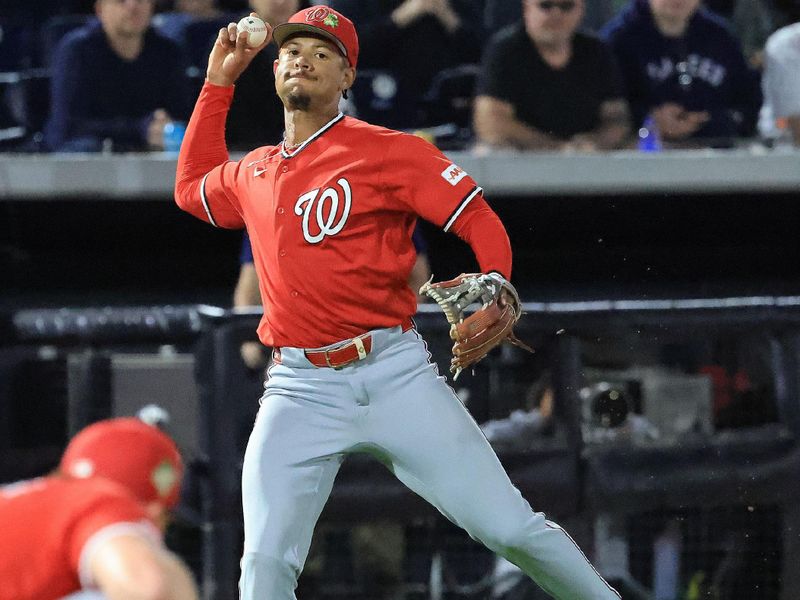 Feb 25, 2026; Tampa, Florida, USA; Washington Nationals infielder Trey Lipscomb (38) throws the ball to first base for an out against the New York Yankees during the fifth inning at George M. Steinbrenner Field. Mandatory Credit: Kim Klement Neitzel-Imagn Images