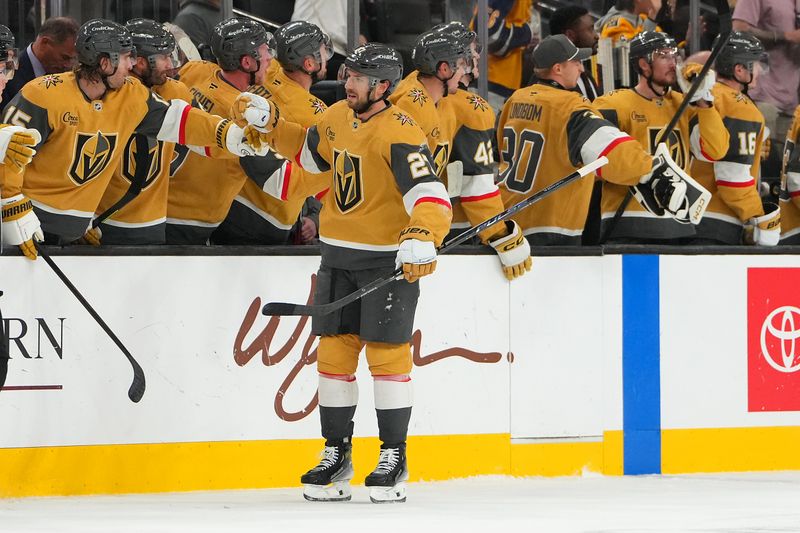 Nov 13, 2025; Las Vegas, Nevada, USA; Vegas Golden Knights defenseman Shea Theodore (27) celebrates after scoring a goal against the New York Islanders during the second period at T-Mobile Arena. Mandatory Credit: Stephen R. Sylvanie-Imagn Images