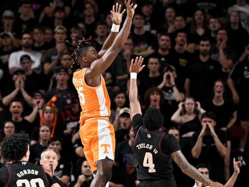 Feb 21, 2023; College Station, Texas, USA; Tennessee Volunteers guard Jahmai Mashack (15) shoots over Texas A&M Aggies guard Wade Taylor IV (4) during the second half at Reed Arena. Mandatory Credit: Maria Lysaker-USA TODAY Sports