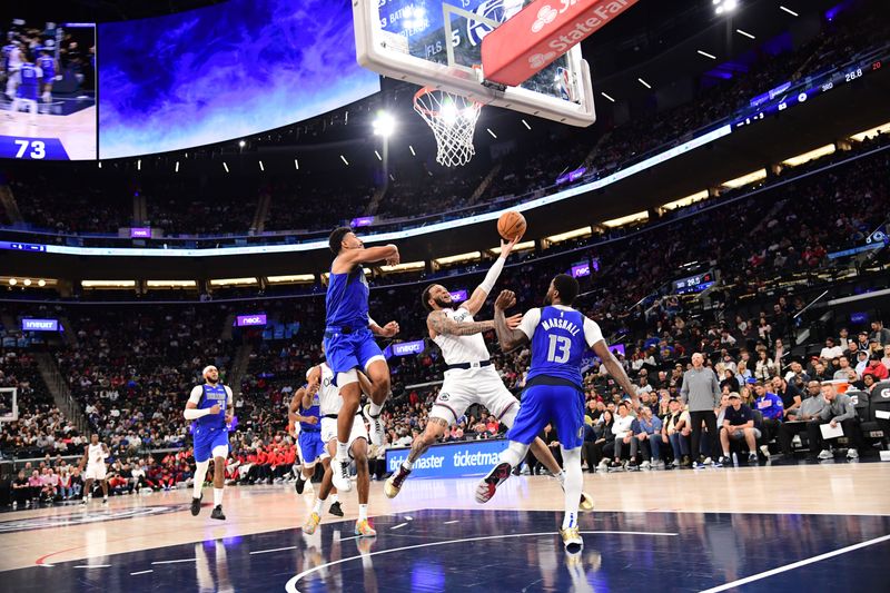 INGLEWOOD, CA - OCTOBER 14: Norman Powell #24 of the LA Clippers drives to the basket during the game against the Dallas Mavericks during a NBA Preseason game on October 14, 2024 at the Intuit Dome in Inglewood, California. NOTE TO USER: User expressly acknowledges and agrees that, by downloading and/or using this Photograph, user is consenting to the terms and conditions of the Getty Images License Agreement. Mandatory Copyright Notice: Copyright 2024 NBAE (Photo by Adam Pantozzi/NBAE via Getty Images)