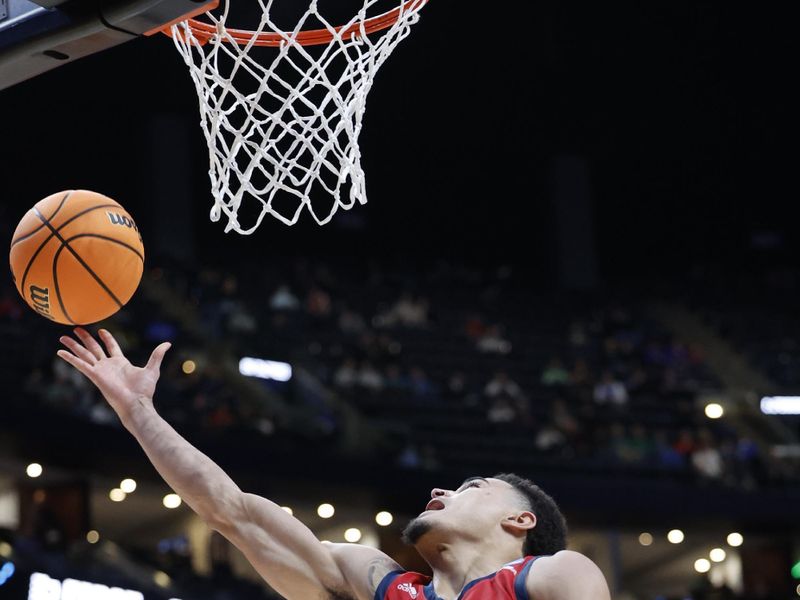 Mar 17, 2023; Columbus, OH, USA; Florida Atlantic Owls guard Bryan Greenlee (4) drives to the basket in the second half against the Memphis Tigers at Nationwide Arena. Mandatory Credit: Rick Osentoski-USA TODAY Sports