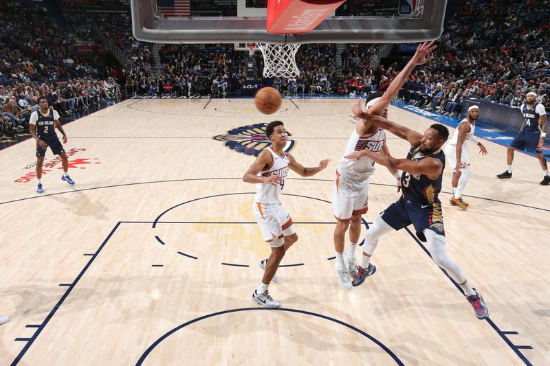 NEW ORLEANS, LA - DECEMBER 5: CJ McCollum #3 of the New Orleans Pelicans passes the ball during the game against the Phoenix Suns on December 5, 2024 at the Smoothie King Center in New Orleans, Louisiana. NOTE TO USER: User expressly acknowledges and agrees that, by downloading and or using this Photograph, user is consenting to the terms and conditions of the Getty Images License Agreement. Mandatory Copyright Notice: Copyright 2024 NBAE (Photo by Layne Murdoch Jr./NBAE via Getty Images)