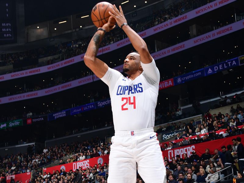 LOS ANGELES, CA - APRIL 4: Norman Powell #24 of the LA Clippers shoots the ball during the game against the Denver Nuggets on April 4, 2024 at Crypto.Com Arena in Los Angeles, California. NOTE TO USER: User expressly acknowledges and agrees that, by downloading and/or using this Photograph, user is consenting to the terms and conditions of the Getty Images License Agreement. Mandatory Copyright Notice: Copyright 2024 NBAE (Photo by Adam Pantozzi/NBAE via Getty Images)