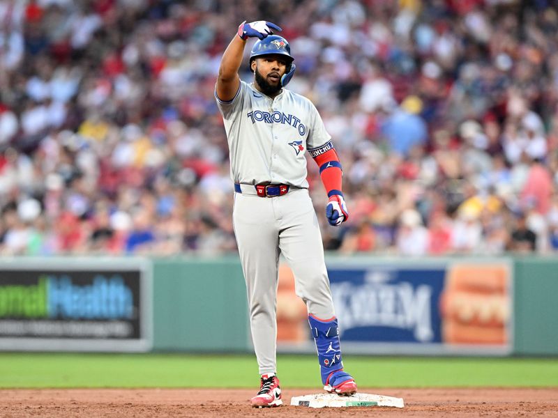 Jun 25, 2024; Boston, Massachusetts, USA; Toronto Blue Jays first baseman Vladimir Guerrero Jr. (27) reacts after hitting a two-run RBI double against the Boston Red Sox during the third inning at Fenway Park. Mandatory Credit: Brian Fluharty-USA TODAY Sports