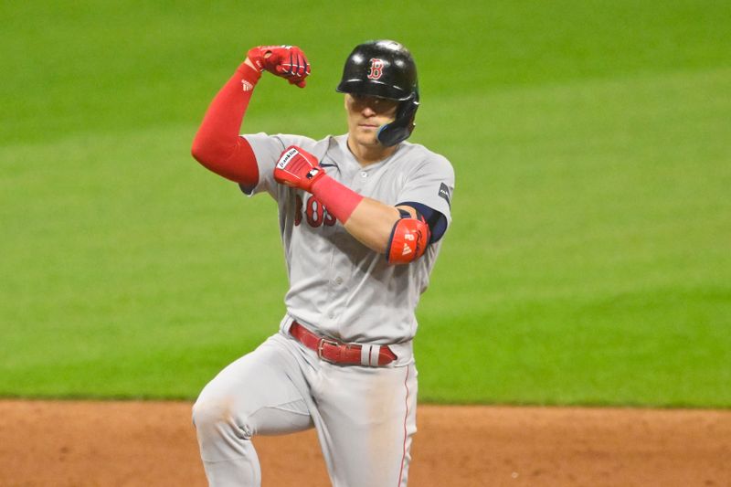 Jun 8, 2023; Cleveland, Ohio, USA; Boston Red Sox shortstop Enrique Hernandez (5) celebrates his RBI double in the ninth inning against the Cleveland Guardians at Progressive Field. Mandatory Credit: David Richard-USA TODAY Sports