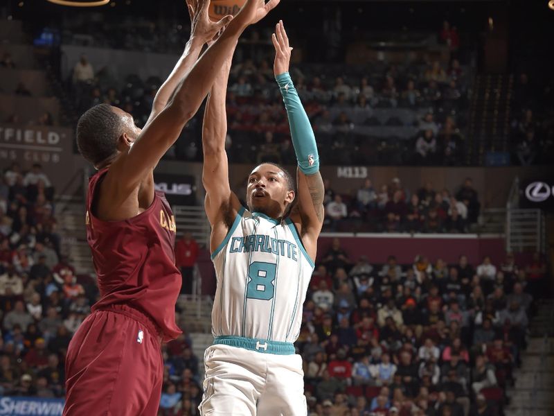 CLEVELAND, OH - JANUARY 5: Nick Smith Jr. #8 of the Charlotte Hornets shoots the ball during the game against the Cleveland Cavaliers on January 5, 2025 at Rocket Mortgage FieldHouse in Cleveland, Ohio. NOTE TO USER: User expressly acknowledges and agrees that, by downloading and/or using this Photograph, user is consenting to the terms and conditions of the Getty Images License Agreement. Mandatory Copyright Notice: Copyright 2025 NBAE (Photo by David Liam Kyle/NBAE via Getty Images)