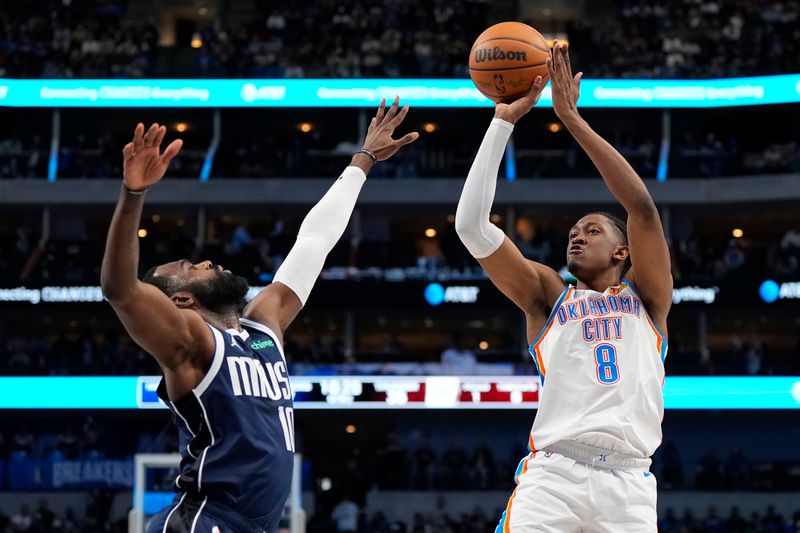 DALLAS, TEXAS - FEBRUARY 10: Jalen Williams #8 of the Oklahoma City Thunder shoots as Tim Hardaway Jr. #10 of the Dallas Mavericks defends during the first half at American Airlines Center on February 10, 2024 in Dallas, Texas. NOTE TO USER: User expressly acknowledges and agrees that, by downloading and or using this photograph, User is consenting to the terms and conditions of the Getty Images License Agreement. (Photo by Sam Hodde/Getty Images)