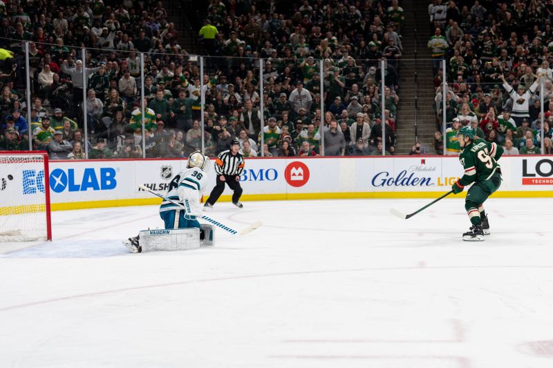 Mar 3, 2024; Saint Paul, Minnesota, USA; Minnesota Wild left wing Kirill Kaprizov (97) scores on San Jose Sharks goaltender Kaapo Kahkonen (36) in the second period at Xcel Energy Center. Mandatory Credit: Matt Blewett-USA TODAY Sports