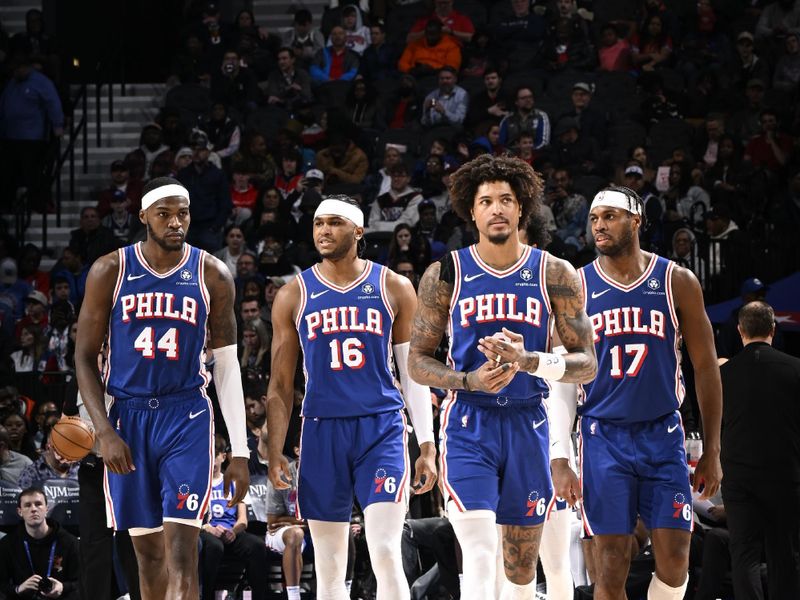 PHILADELPHIA, PA - MARCH 6: Paul Reed #44, Ricky Council IV #16, Kelly Oubre Jr. #9 and Buddy Heild #17 of the Philadelphia 76ers looks on during the game against the Memphis Grizzlies on March 6, 2024 at the Wells Fargo Center in Philadelphia, Pennsylvania NOTE TO USER: User expressly acknowledges and agrees that, by downloading and/or using this Photograph, user is consenting to the terms and conditions of the Getty Images License Agreement. Mandatory Copyright Notice: Copyright 2024 NBAE (Photo by David Dow/NBAE via Getty Images)