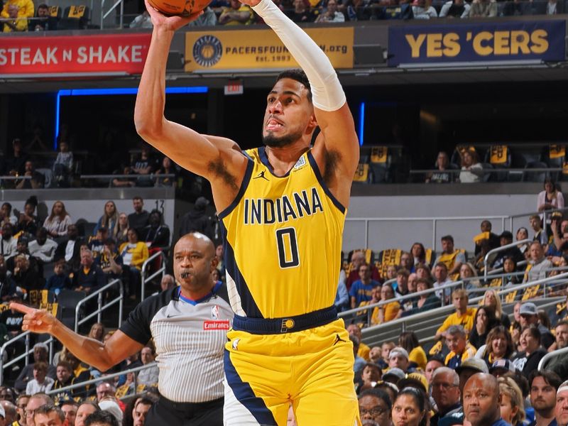 INDIANAPOLIS, IN - OCTOBER 27: Tyrese Haliburton #0 of the Indiana Pacers three point basket during the game against the Philadelphia 76ers on October 27, 2024 at Gainbridge Fieldhouse in Indianapolis, Indiana. NOTE TO USER: User expressly acknowledges and agrees that, by downloading and or using this Photograph, user is consenting to the terms and conditions of the Getty Images License Agreement. Mandatory Copyright Notice: Copyright 2024 NBAE (Photo by Ron Hoskins/NBAE via Getty Images)