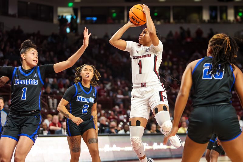 Dec 3, 2022; Columbia, South Carolina, USA; South Carolina Gamecocks guard Zia Cooke (1) shoots over Memphis Tigers forward Hannah Riddick (1) in the first half at Colonial Life Arena. Mandatory Credit: Jeff Blake-USA TODAY Sports