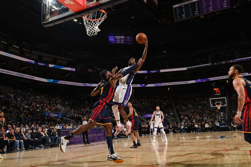 SAN FRANCISCO, CA - JANUARY 5: Malik Monk #0 of the Sacramento Kings drives to the basket during the game against the Golden State Warriors on January 5, 2025 at Chase Center in San Francisco, California. NOTE TO USER: User expressly acknowledges and agrees that, by downloading and or using this photograph, user is consenting to the terms and conditions of Getty Images License Agreement. Mandatory Copyright Notice: Copyright 2025 NBAE (Photo by Noah Graham/NBAE via Getty Images)