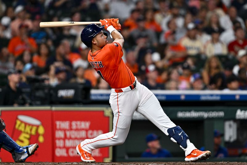 Jun 27, 2025; Houston, Texas, USA; Houston Astros outfielder Cam Smith (11) three run home run in the fourth inning against the Chicago Cubs at Daikin Park. Mandatory Credit: Maria Lysaker-Imagn Images 