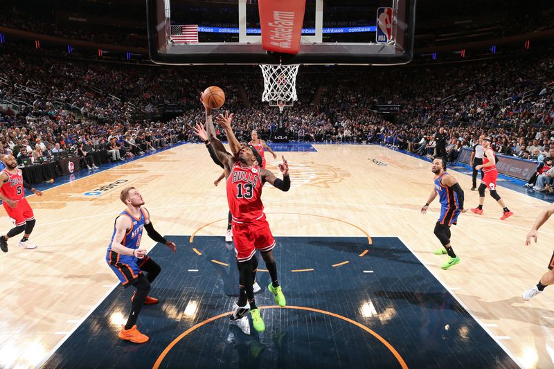 NEW YORK, NY - APRIL 14: Torrey Craig #13 of Chicago Bulls grabs a rebound during the game against the New York Knicks  on April 14, 2024 at Madison Square Garden in New York City, New York.  NOTE TO USER: User expressly acknowledges and agrees that, by downloading and or using this photograph, User is consenting to the terms and conditions of the Getty Images License Agreement. Mandatory Copyright Notice: Copyright 2024 NBAE  (Photo by Nathaniel S. Butler/NBAE via Getty Images)