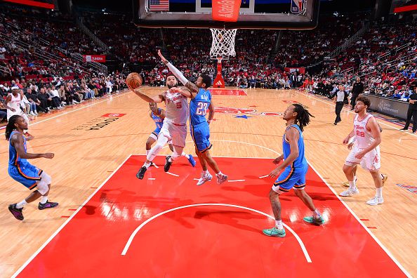 HOUSTON, TX - DECEMBER 6:   Fred VanVleet #5 of the Houston Rockets drives to the basket during the game against the Oklahoma City Thunder on December 6, 2023 at the Toyota Center in Houston, Texas. NOTE TO USER: User expressly acknowledges and agrees that, by downloading and or using this photograph, User is consenting to the terms and conditions of the Getty Images License Agreement. Mandatory Copyright Notice: Copyright 2023 NBAE (Photo by Michael Gonzales/NBAE via Getty Images)