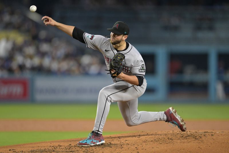 May 20, 2024; Los Angeles, California, USA;  Arizona Diamondbacks starting pitcher Slade Cecconi (43) delivers to the plate in the third inning against the Los Angeles Dodgers at Dodger Stadium. Mandatory Credit: Jayne Kamin-Oncea-USA TODAY Sports