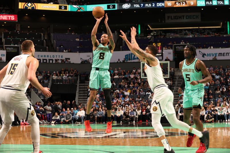 CHARLOTTE, NC - FEBRUARY 1: Nick Smith Jr. #8 of the Charlotte Hornets shoots the ball during the game against the Denver Nuggets on February 1, 2025 at Spectrum Center in Charlotte, North Carolina. NOTE TO USER: User expressly acknowledges and agrees that, by downloading and or using this photograph, User is consenting to the terms and conditions of the Getty Images License Agreement. Mandatory Copyright Notice: Copyright 2025 NBAE (Photo by Kent Smith/NBAE via Getty Images)