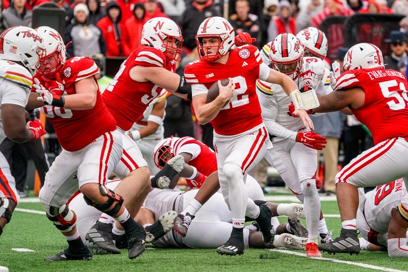 Nov 11, 2023; Lincoln, Nebraska, USA; Nebraska Cornhuskers quarterback Chubba Purdy (12) runs against the Maryland Terrapins during the fourth quarter at Memorial Stadium. Mandatory Credit: Dylan Widger-USA TODAY Sports