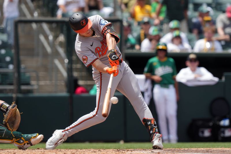 Jun 8, 2025; West Sacramento, California, USA; Baltimore Orioles designated hitter Coby Mayo (16) hits a single against the Athletics during the fourth inning at Sutter Health Park. Mandatory Credit: Darren Yamashita-Imagn Images