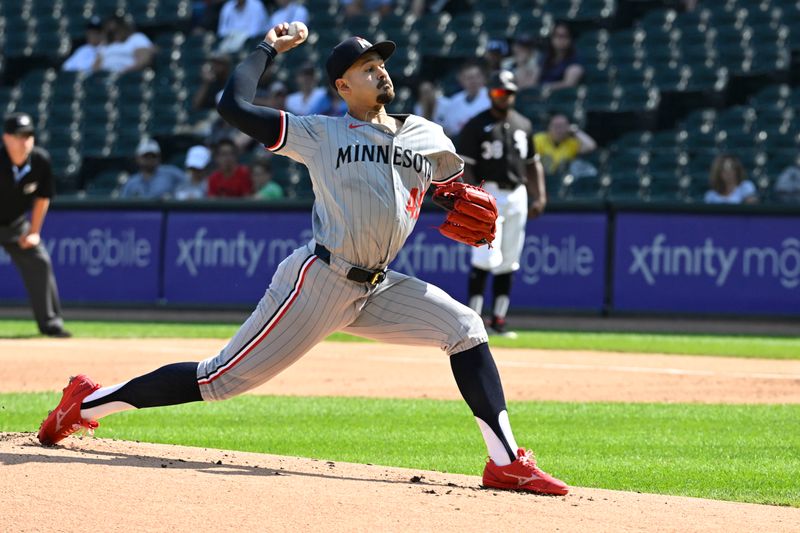 Jul 10, 2024; Chicago, Illinois, USA;  Minnesota Twins pitcher Pablo Lopez (49) delivers against the Chicago White Sox during the first inning at Guaranteed Rate Field. Mandatory Credit: Matt Marton-USA TODAY Sports