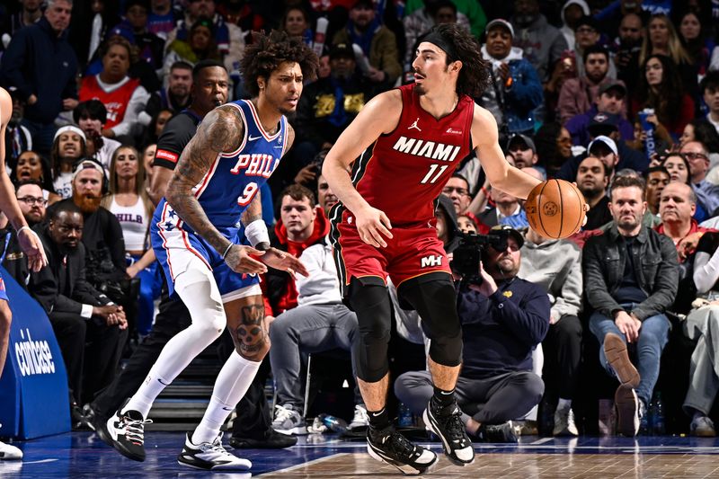 PHILADELPHIA, PA - MARCH 18: Jaime Jaquez Jr. #11 of the Miami Heat dribbles the ball during the game against the Philadelphia 76ers  on March 18, 2024 at the Wells Fargo Center in Philadelphia, Pennsylvania NOTE TO USER: User expressly acknowledges and agrees that, by downloading and/or using this Photograph, user is consenting to the terms and conditions of the Getty Images License Agreement. Mandatory Copyright Notice: Copyright 2024 NBAE (Photo by David Dow/NBAE via Getty Images)