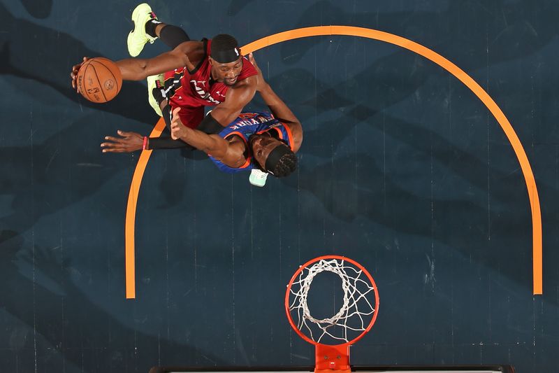 NEW YORK, NY - JANUARY 27: Bam Adebayo #13 of the Miami Heat drives to the basket during the game against the New York Knicks on January 27, 2024 at Madison Square Garden in New York City, New York.  NOTE TO USER: User expressly acknowledges and agrees that, by downloading and or using this photograph, User is consenting to the terms and conditions of the Getty Images License Agreement. Mandatory Copyright Notice: Copyright 2024 NBAE  (Photo by Nathaniel S. Butler/NBAE via Getty Images)