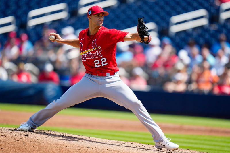 Mar 11, 2023; West Palm Beach, Florida, USA; St. Louis Cardinals starting pitcher Jack Flaherty (22) throws a pitch against the Houston Astros during the first inning at The Ballpark of the Palm Beaches. Mandatory Credit: Rich Storry-USA TODAY Sports