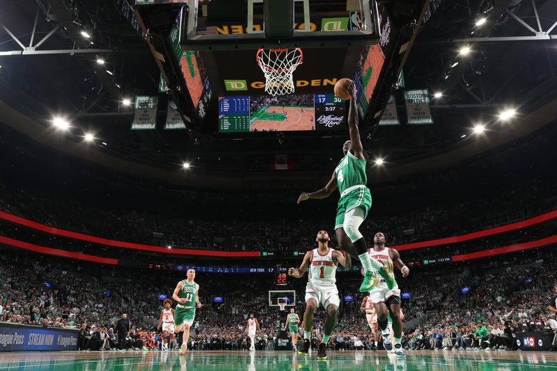 BOSTON, MA - OCTOBER 22: Jrue Holiday #4 of the Boston Celtics drives to the basket during the game against the New York Knicks on October 22, 2024 at TD Garden in Boston, Massachusetts. NOTE TO USER: User expressly acknowledges and agrees that, by downloading and or using this Photograph, user is consenting to the terms and conditions of the Getty Images License Agreement. Mandatory Copyright Notice: Copyright 2024 NBAE (Photo by Nathaniel S. Butler/NBAE via Getty Images)