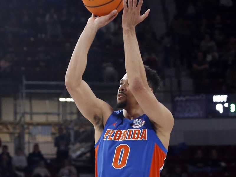 Jan 21, 2023; Starkville, Mississippi, USA; Florida Gators guard Myreon Jones (0) shoots during the first half against the Mississippi State Bulldogs at Humphrey Coliseum. Mandatory Credit: Petre Thomas-USA TODAY Sports