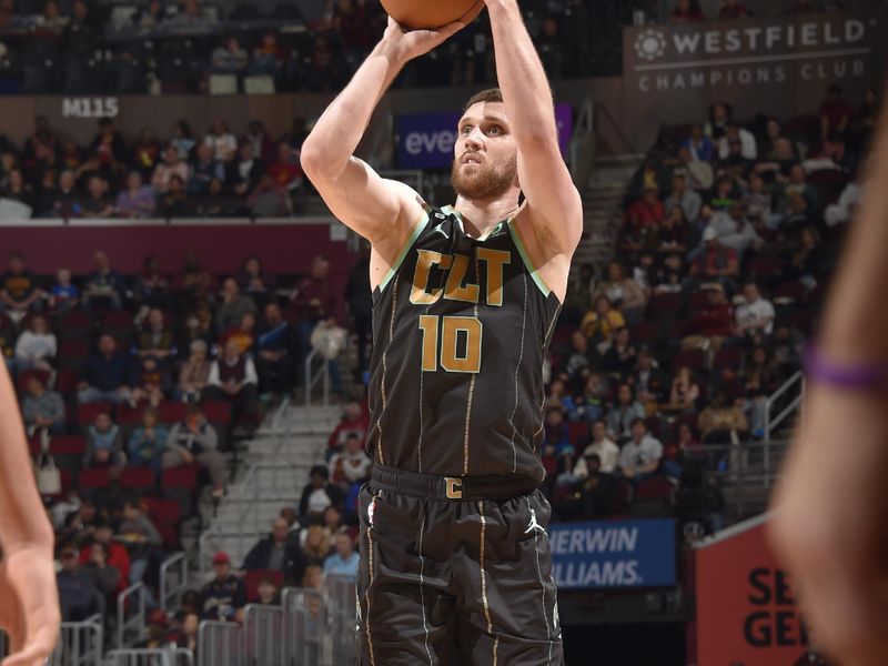 CLEVELAND, OH - APRIL 9: Svi Mykhailiuk #10 of the Charlotte Hornets shoots the ball during the game against the Charlotte Hornets on April 9, 2023 at Rocket Mortgage FieldHouse in Cleveland, Ohio. NOTE TO USER: User expressly acknowledges and agrees that, by downloading and/or using this Photograph, user is consenting to the terms and conditions of the Getty Images License Agreement. Mandatory Copyright Notice: Copyright 2023 NBAE (Photo by David Liam Kyle/NBAE via Getty Images)