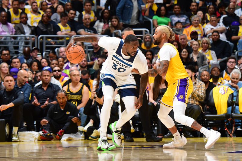 LOS ANGELES, CA - OCTOBER 22: Julius Randle #30 of the Minnesota Timberwolves dribbles the ball during the game against the Los Angeles Lakers on October 22, 2024 at Crypto.Com Arena in Los Angeles, California. NOTE TO USER: User expressly acknowledges and agrees that, by downloading and/or using this Photograph, user is consenting to the terms and conditions of the Getty Images License Agreement. Mandatory Copyright Notice: Copyright 2024 NBAE (Photo by Adam Pantozzi/NBAE via Getty Images)