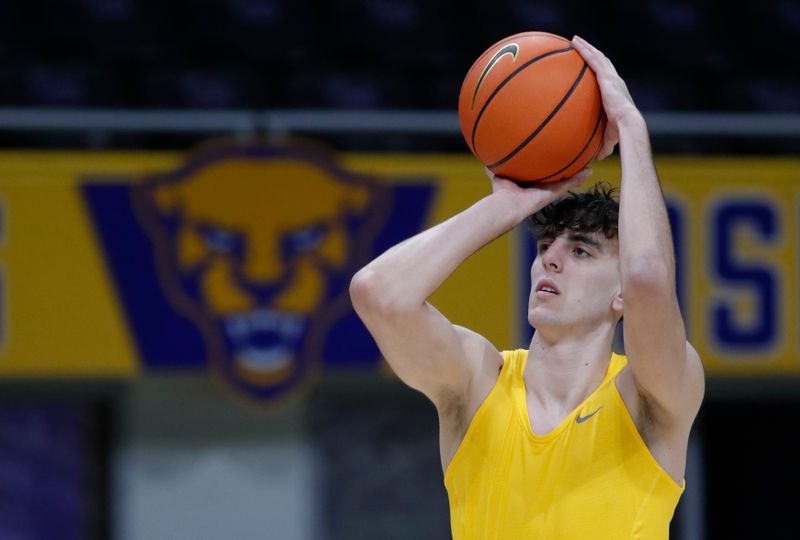 Jan 16, 2024; Pittsburgh, Pennsylvania, USA; Pittsburgh Panthers forward Guillermo Diaz Graham (25) warms up before the game against the Syracuse Orange at the Petersen Events Center. Mandatory Credit: Charles LeClaire-USA TODAY Sports