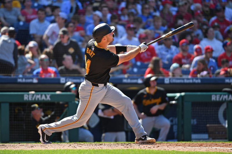 Apr 14, 2024; Philadelphia, Pennsylvania, USA; Pittsburgh Pirates catcher Joey Bart (14) watches his home run against the Philadelphia Phillies during the sixth inning at Citizens Bank Park. Mandatory Credit: Eric Hartline-USA TODAY Sports