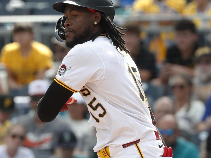 Aug 18, 2024; Pittsburgh, Pennsylvania, USA;  Pittsburgh Pirates shortstop Oneil Cruz (15) hits a single against the Seattle Mariners during the sixth inning at PNC Park. Mandatory Credit: Charles LeClaire-USA TODAY Sports