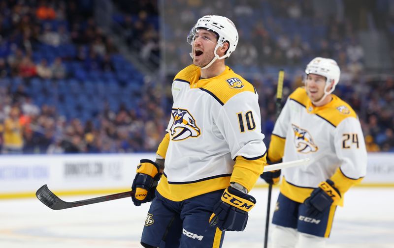 Dec 3, 2023; Buffalo, New York, USA;  Nashville Predators center Colton Sissons (10) reacts after his team scores a goal during the first period against the Buffalo Sabres at KeyBank Center. Mandatory Credit: Timothy T. Ludwig-USA TODAY Sports