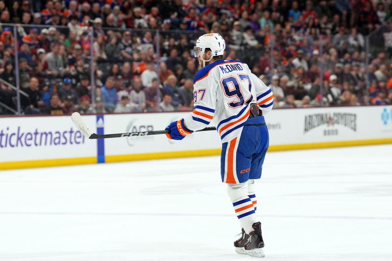 Feb 19, 2024; Tempe, Arizona, USA; Edmonton Oilers center Connor McDavid (97) skates against the Arizona Coyotes during the second period at Mullett Arena. Mandatory Credit: Joe Camporeale-USA TODAY Sports