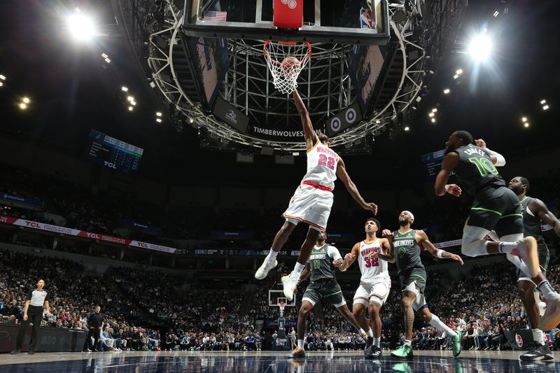 MINNEAPOLIS, MN -  JANUARY 15:  Andrew Wiggins #22 of the Golden State Warriors drives to the basket during the game against the Minnesota Timberwolves on January 15, 2025 at Target Center in Minneapolis, Minnesota. NOTE TO USER: User expressly acknowledges and agrees that, by downloading and or using this Photograph, user is consenting to the terms and conditions of the Getty Images License Agreement. Mandatory Copyright Notice: Copyright 2025 NBAE (Photo by David Sherman/NBAE via Getty Images)