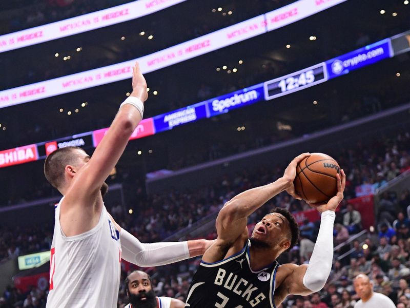 LOS ANGELES, CA - MARCH 10: Giannis Antetokounmpo #34 of the Milwaukee Bucks handles the ball during the game against the LA Clippers on March 10, 2024 at Crypto.Com Arena in Los Angeles, California. NOTE TO USER: User expressly acknowledges and agrees that, by downloading and/or using this Photograph, user is consenting to the terms and conditions of the Getty Images License Agreement. Mandatory Copyright Notice: Copyright 2024 NBAE (Photo by Adam Pantozzi/NBAE via Getty Images)