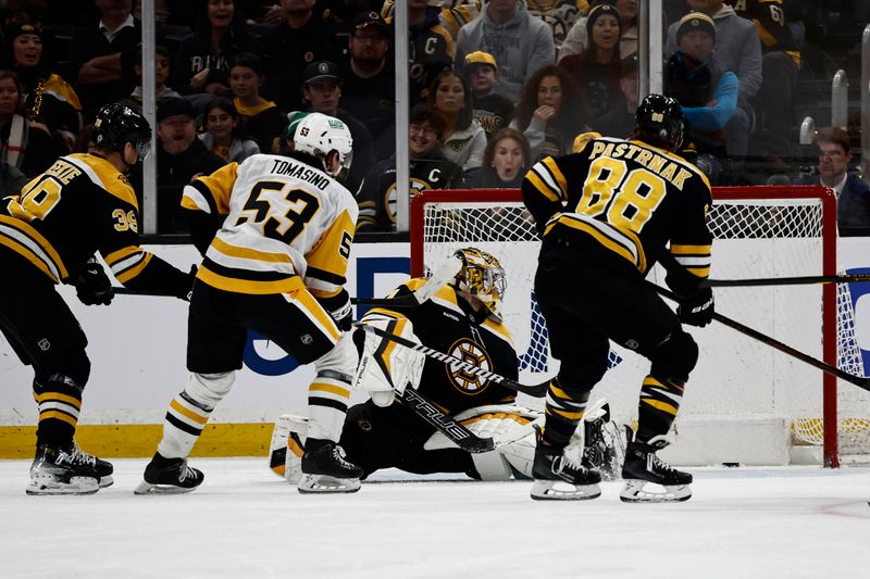 Nov 29, 2024; Boston, Massachusetts, USA; Pittsburgh Penguins center Philip Tomasino (53) scores the winning goal on Boston Bruins goaltender Jeremy Swayman (1) during the third period at TD Garden. Mandatory Credit: Winslow Townson-Imagn Images