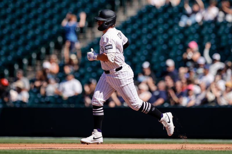 Sep 18, 2025; Denver, Colorado, USA; Colorado Rockies first baseman Blaine Crim (16) rounds the bases on a solo home run in the second inning against the Miami Marlins at Coors Field. Mandatory Credit: Isaiah J. Downing-Imagn Images