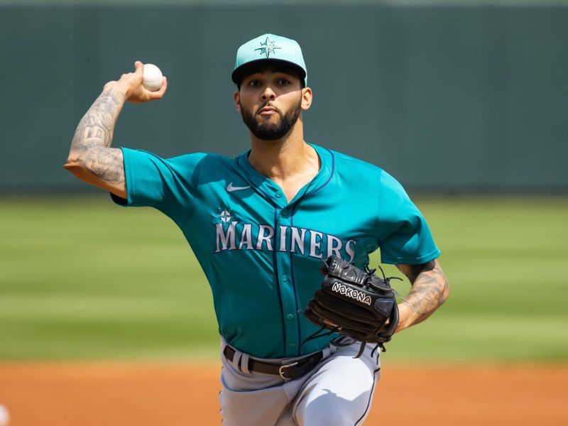 Mar 18, 2024; Surprise, Arizona, USA; Seattle Mariners pitcher Tyson Miller against the Texas Rangers during a spring training baseball game at Surprise Stadium. Mandatory Credit: Mark J. Rebilas-USA TODAY Sports